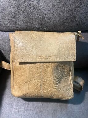 American Leather Co. Embossed Tan Liberty Backpack Bag with magnetic closure